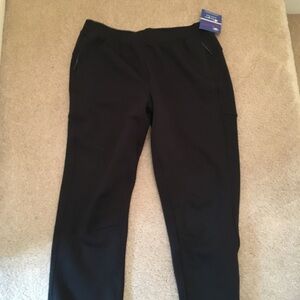 Champion flex pant NWT size 2xl. Black. Side zip pockets and elastic waist.